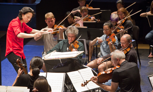 Conductor Carolyn Kuan in rehearsal with Kronos Quartet and the Cabrillo Festival Orchestra. Photo by rr jones.