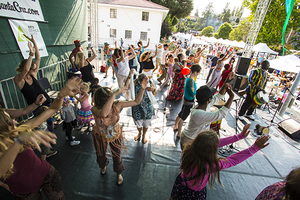 Domu Africa invites the audience on stage for a dance lesson during the Church Street Fair. Photo by rr jones.