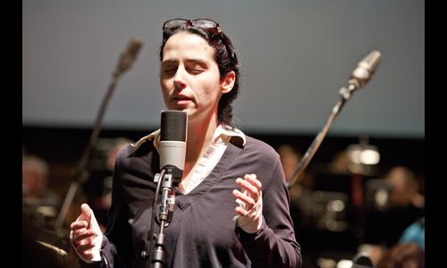 Brazilian composer/performer Clarice Assad rehearses her vocal solo for Hidden World of Girls: Stories for Orchestra. Photo: rr jones