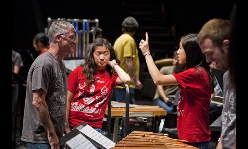 Principal percussionist Galen Lemmon prepares his students for their demonstration in the Free Family Concert. Photo: rr jones