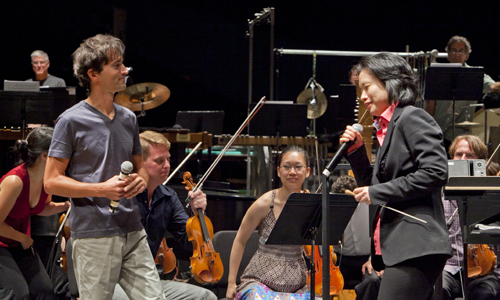 Composer Mason Bates and conductor Carolyn Kuan following the Festival performance of 'Alternative Energy.' Photo by rr jones.