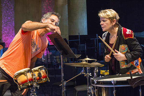 Conductor/(percussionist?) Marin Alsop gets some coaching from Jim Kassis. Photo by rr jones.