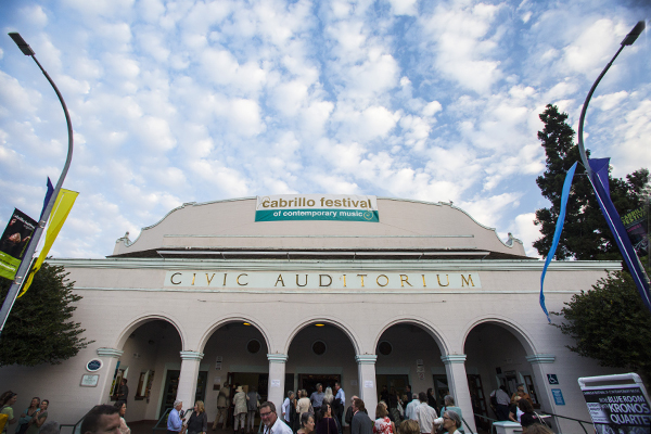 A crown of coulds above our beloved venue, the Santa Cruz Civic Auditorium. Photo by rr jones.