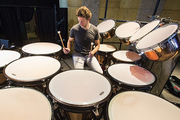 Timpanist Scott Christian gets familiar with the gargantuan 13-piece setup required for Mason Bates' Anthology of Fantastic Zoology. Photo by rr jones.
