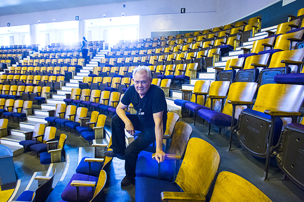 Staff photographer and local legend Ron Jones takes a breather at the Civic Auditorium.