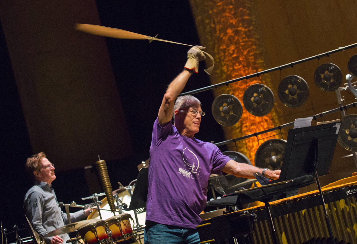 Principal percussionist Galen Lemmon gets swirly in rehearsal for Huang Ruo's Folk Songs.