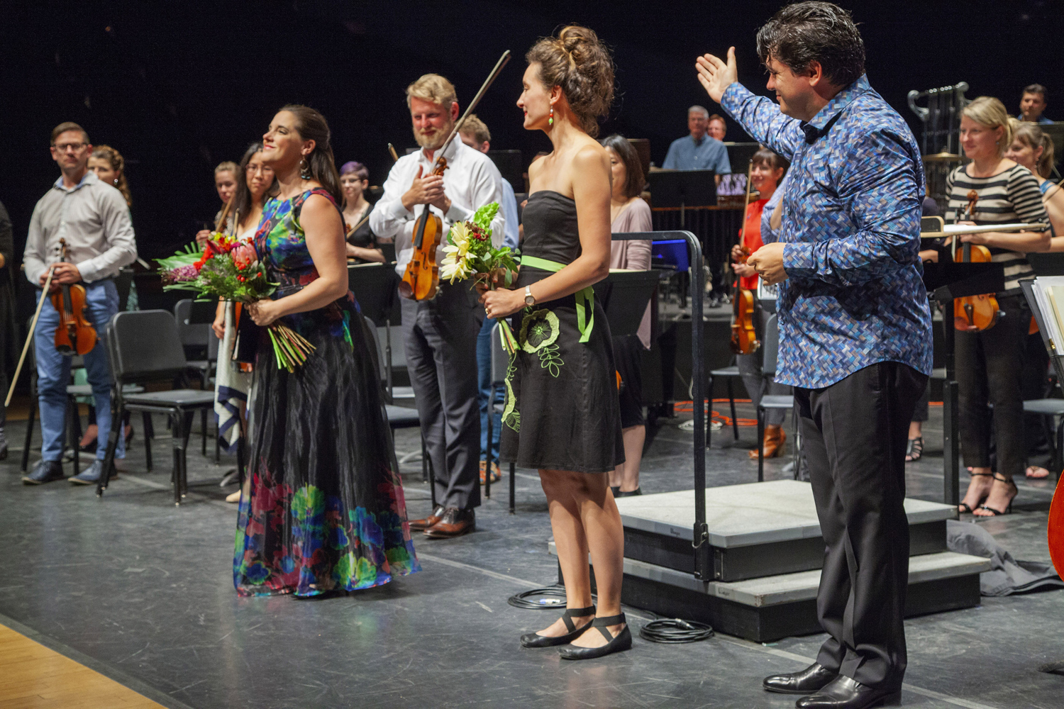 Cristi congratulates soprano Mary Mackenzie (L) and composer Zosha Di Castri (R) following the U.S. premiere of Dear Life.
