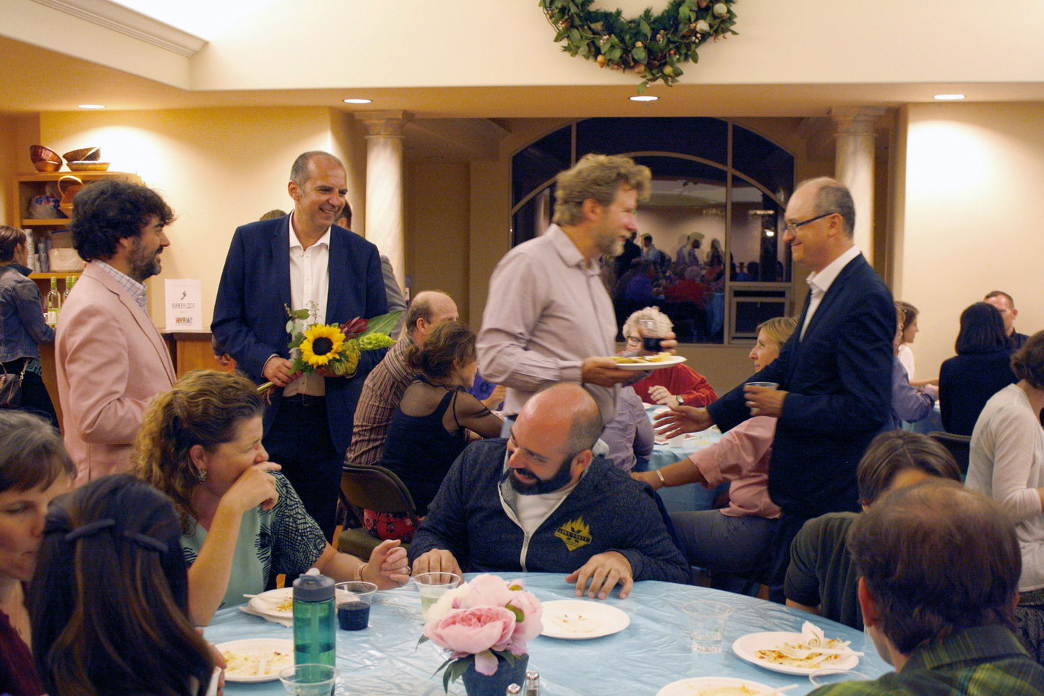 Composers and musicians mingle and relax at the opening night cast party. (staff photo)