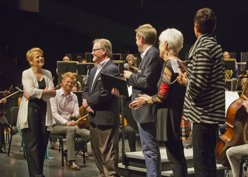 Board President Jim Petersen and fellow Board members offer Marin Alsop the title of Music Director Laureate. Photo by rr jones.
