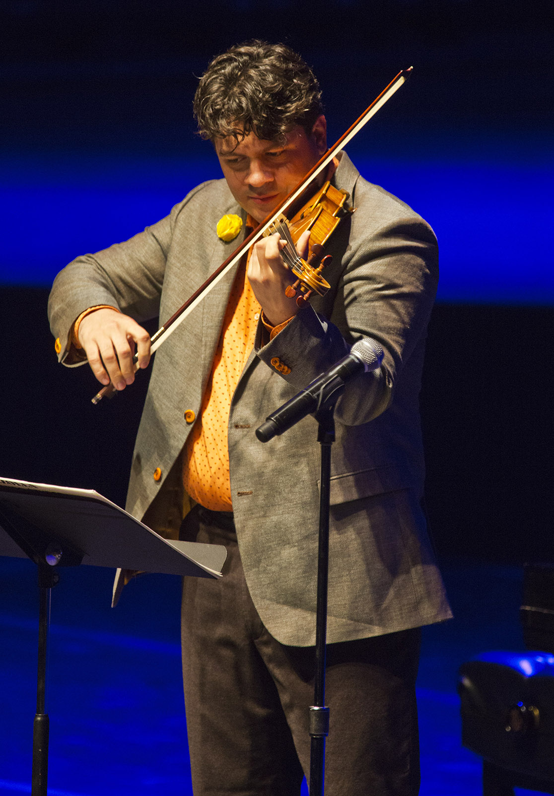 Violinist playing on stage