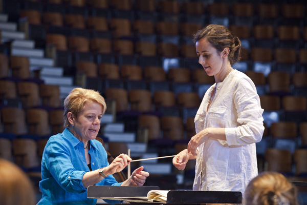 Maestra Alsop instructs conducting student Melisse Brunet in the Conductors/Composers Workshop. Photo by rr jones.