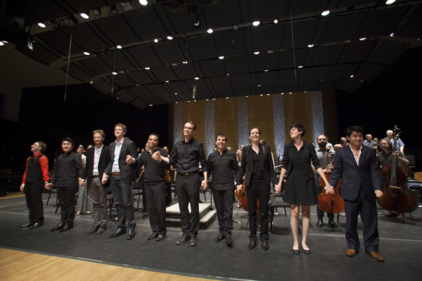 'In the Works' conductors and composers take bows following seven sequential performances of three new works for orchestra, the culmination of the Conductors/Composers Workshop. Photo by rr jones.