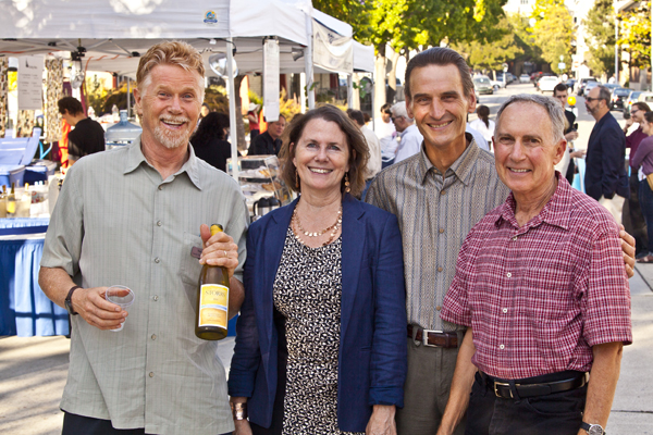 Cabrillo Festival fans, family and friends (L-R) Tom Ellison, Virginia Wright, Tom Fredericks, and Larry Friedman, preparing to enjoy some local wine on Opening Night. Photo by rr jones.