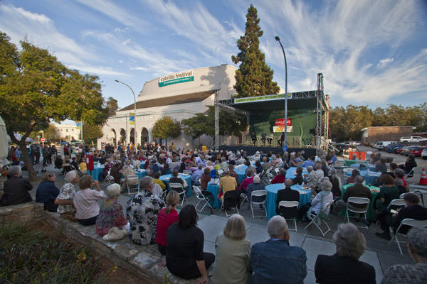 Opening Night Cabrillo Festival crowds enjoy dinner al fresco and a pre-concert talk outside the Santa Cruz Civic Auditorium. Photo by rr jones.