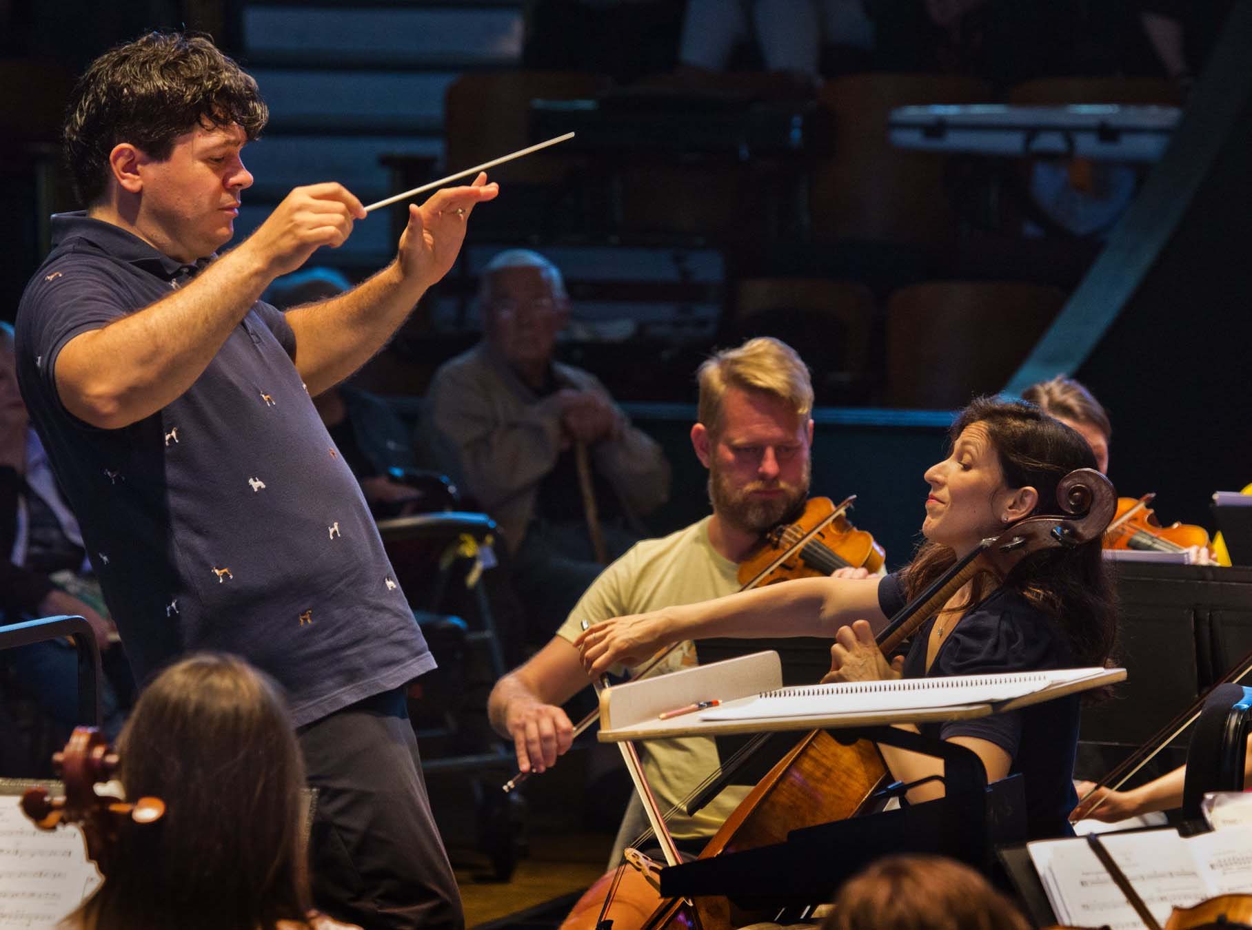 Conductor with musicians