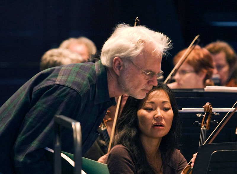 John Adams works with Concertmaster Yumi Hwang Williams, 2010, photo by rr jones.