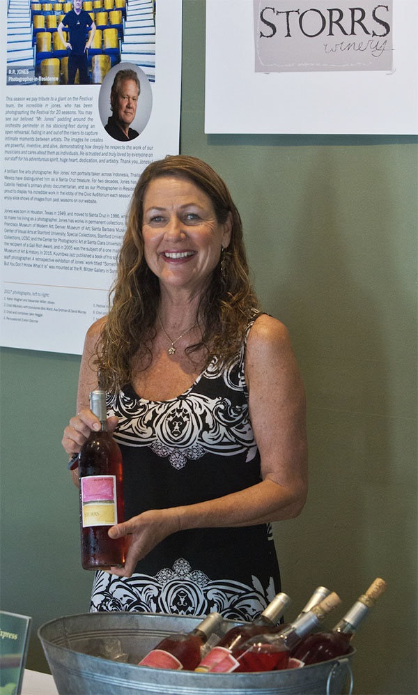 Woman holding wine bottle