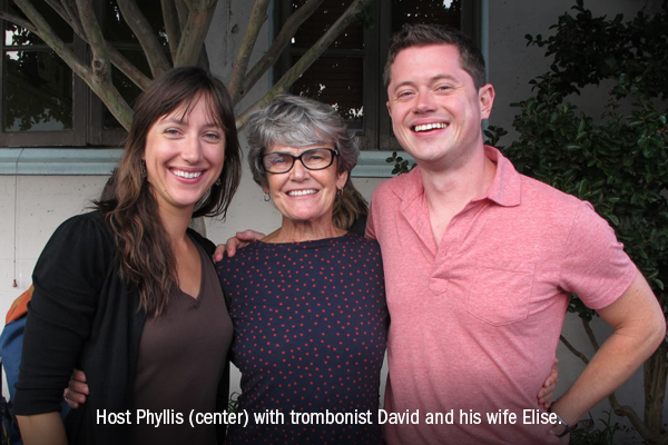 Host Phyllis (center) with trombonist David and his wife Elise.
